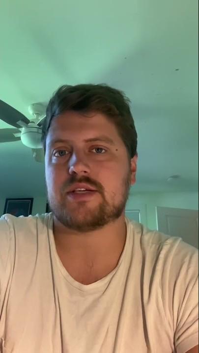 Owner of Asheville Movers talking to camera at home