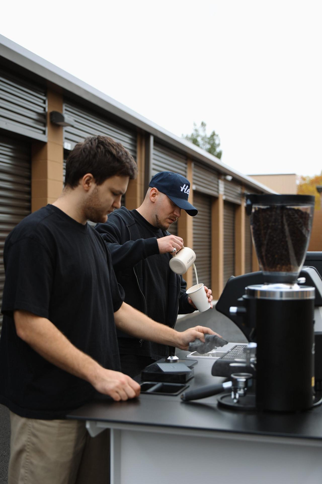 Barista pouring espresso