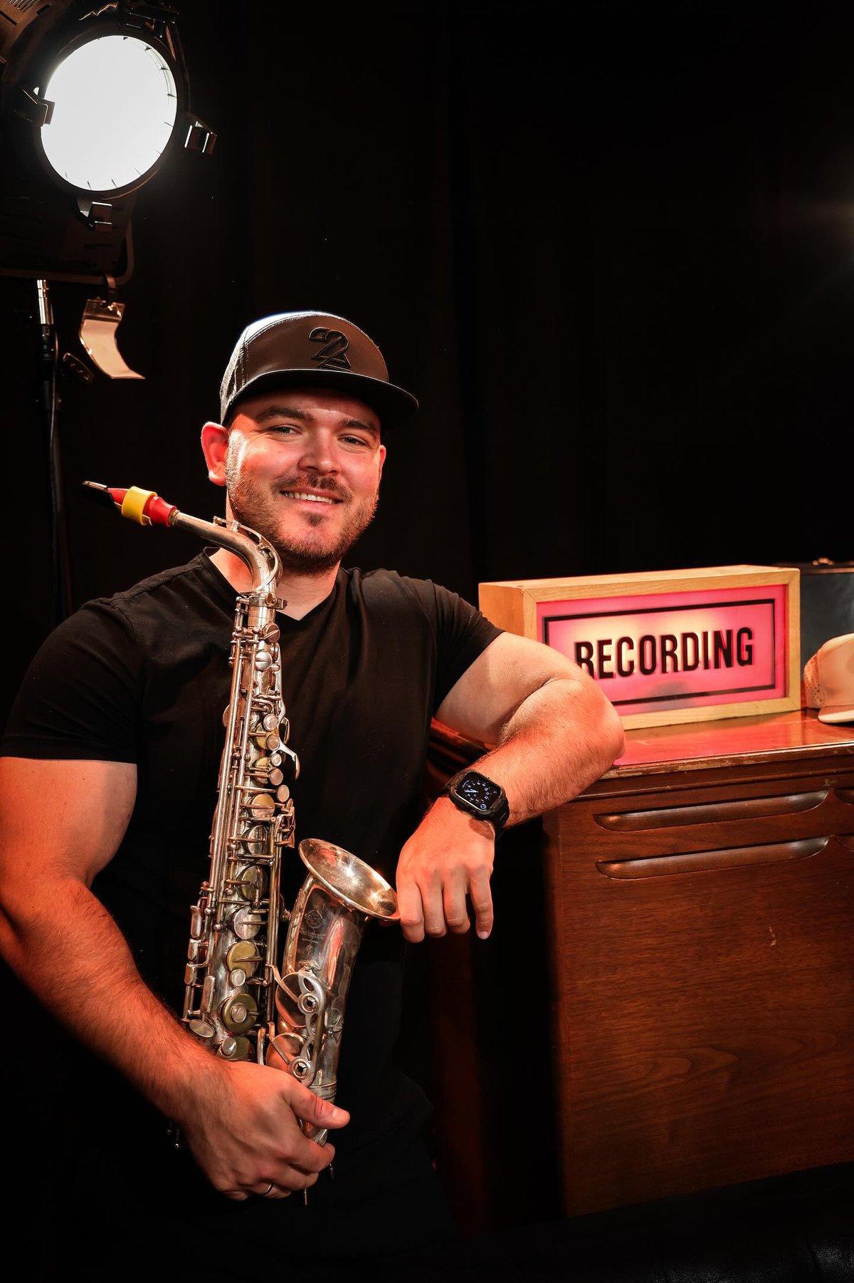 Igor Pererodov, saxophonist, with his alto sax in the studio