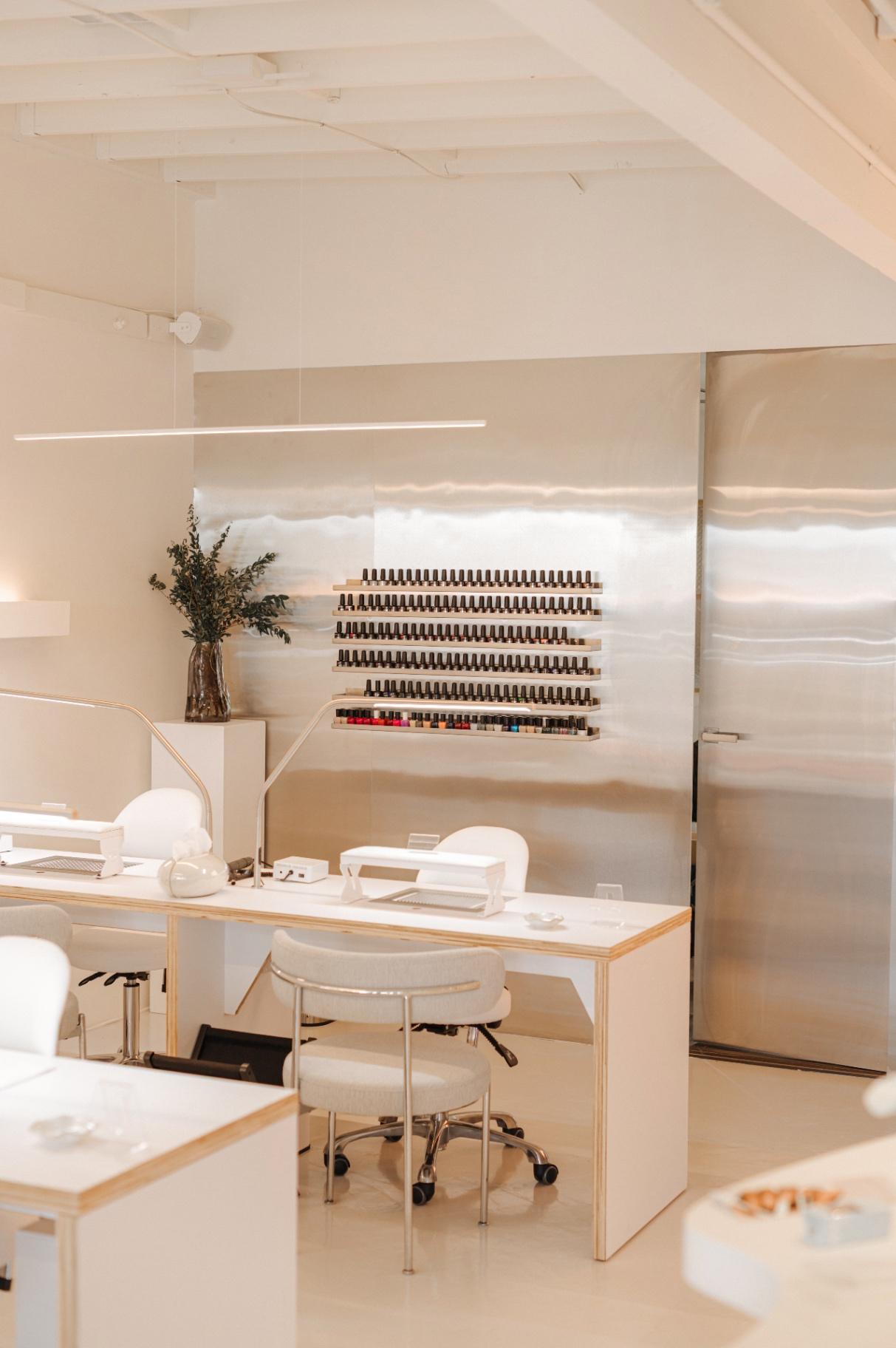 The Svitnail studio in La Jolla: manicure workspace and polish wall